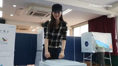 参加国会议员选举投票