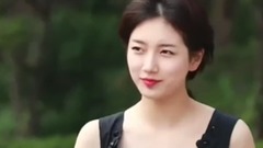 风吹长裙险曝光 秀智尷尬中不失优雅