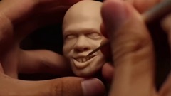 Clay Art making an head carved from clown soul back